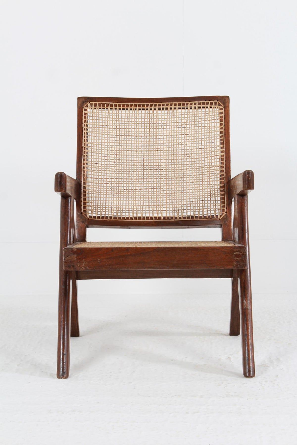 PIERRE JEANNERET MID-CENTURY LOW EASY CHAIR IN TEAK.Price on request