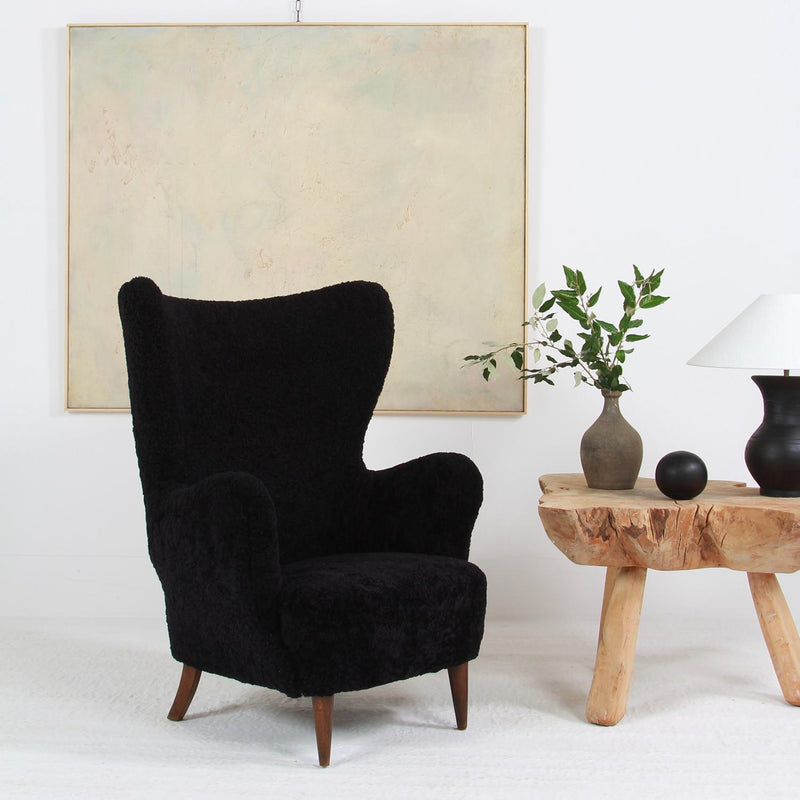 Large Sculptural  Danish Midcentury Winged Back Armchair in Black Sheepskin