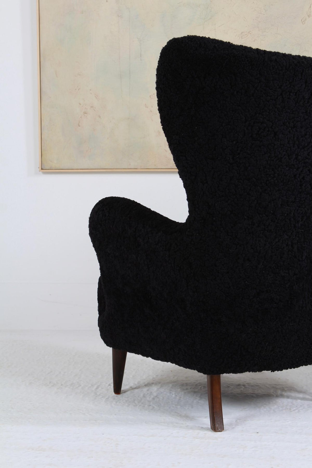 Large Sculptural  Danish Midcentury Winged Back Armchair in Black Sheepskin