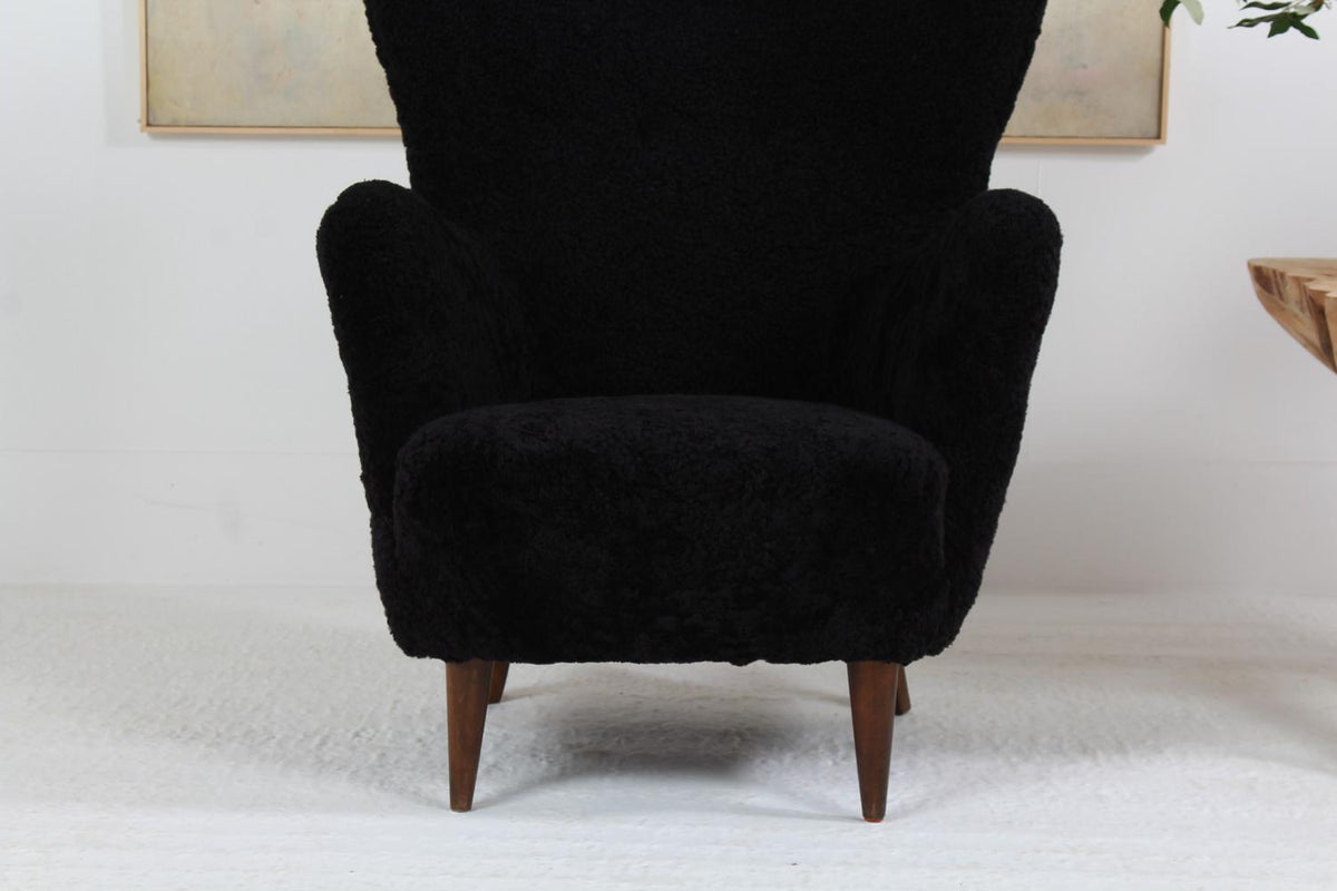 Large Sculptural  Danish Midcentury Winged Back Armchair in Black Sheepskin