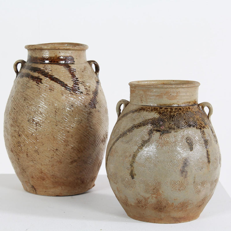 TWO BEAUTIFULLY IMPERFECT TEXTURED FLORAL MOTIF ORIENTAL PRESERVE JARS