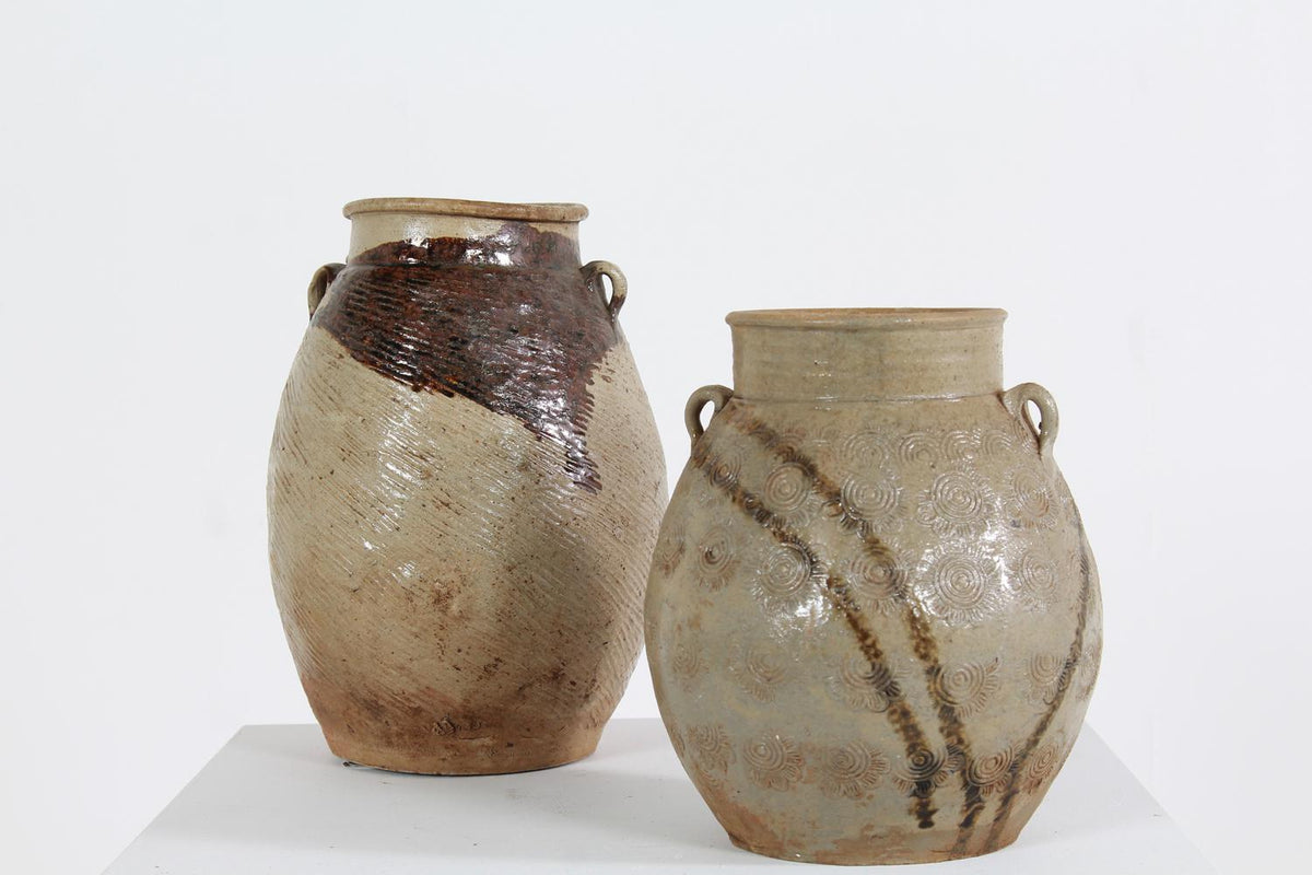 TWO BEAUTIFULLY IMPERFECT TEXTURED FLORAL MOTIF ORIENTAL PRESERVE JARS