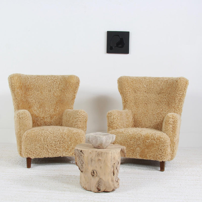 SUMPTUOUS PAIR OF DANISH HIGH-BACK LOUNGE CHAIRS IN HONEY COLOURED SHEEPSKIN