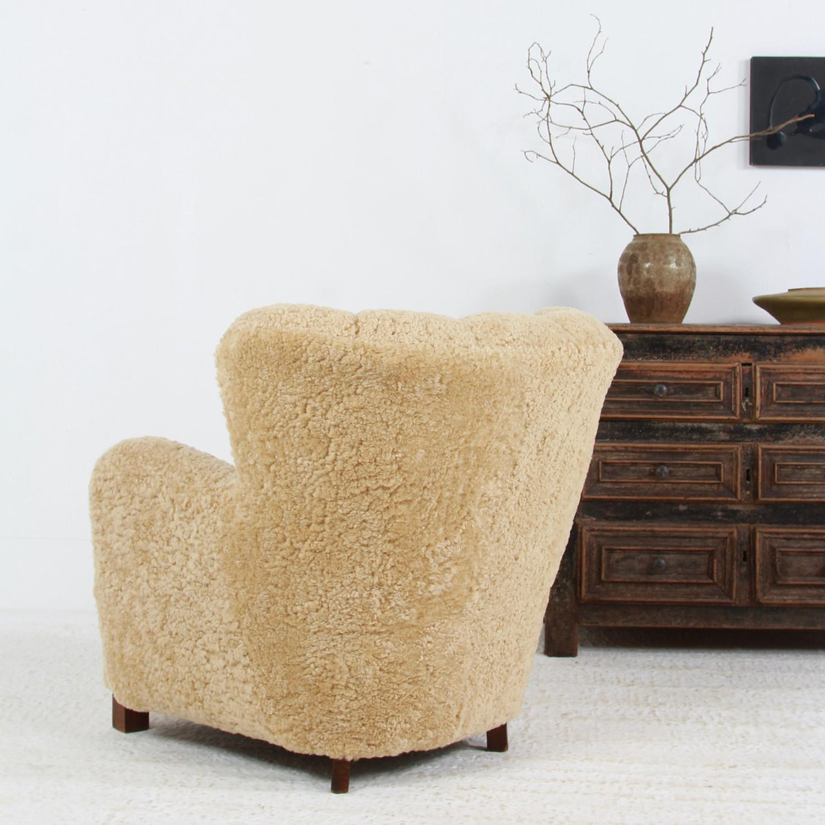 SUMPTUOUS  DANISH CABINET MAKER LOUNGE CHAIR UPHOLSTERED IN HONEY COLOURED SHEEPSKIN