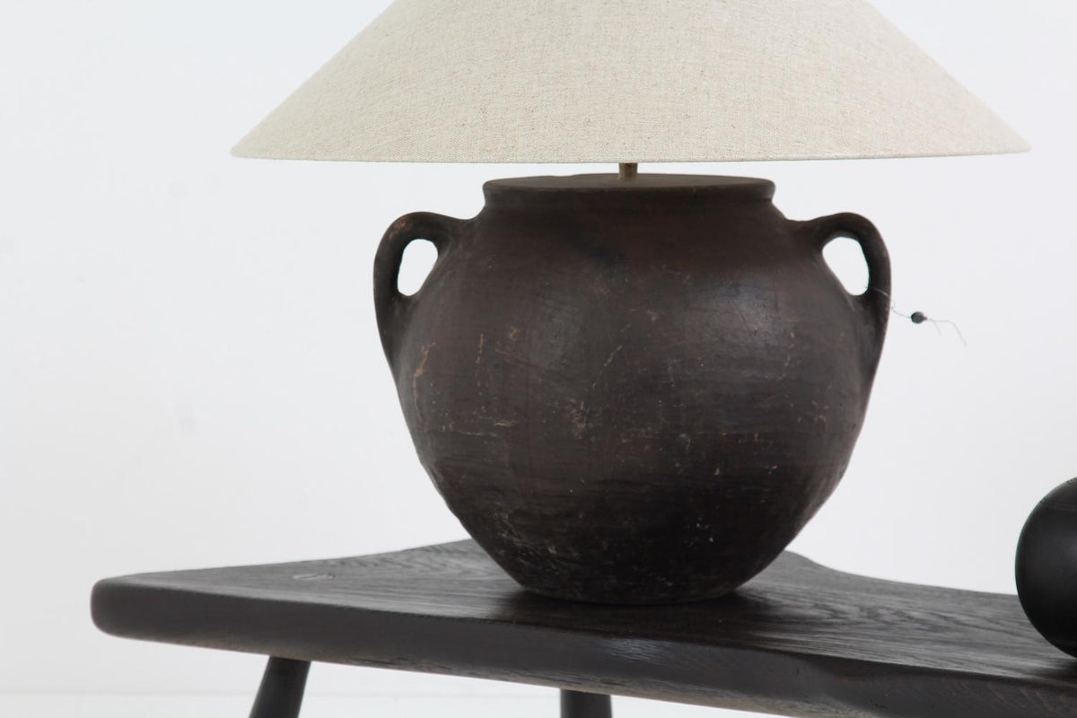 ANTIQUE MEDITERRANEAN BLACK BURNISHED POT LAMP WITH NATURAL LINEN SHADE