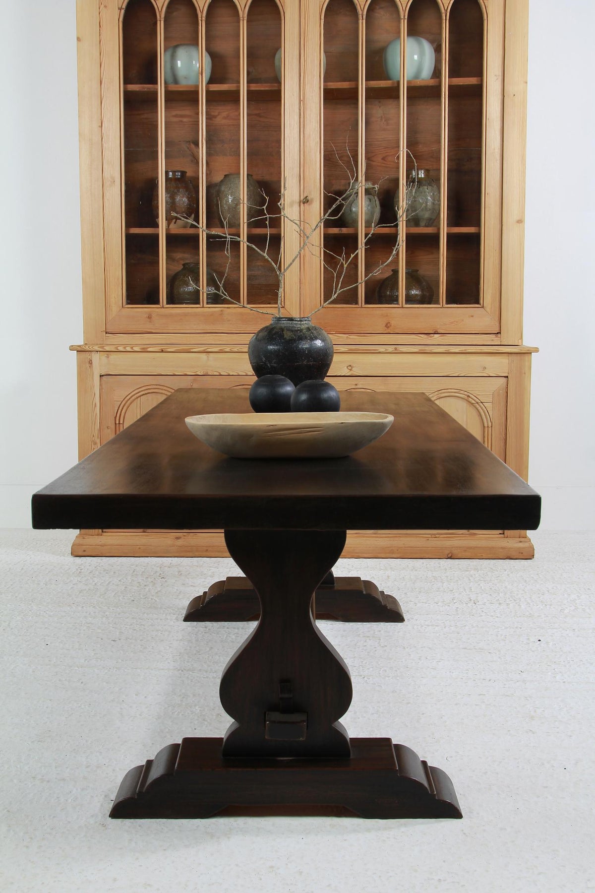 IMPRESSIVE FRENCH EARLY 20THC WALNUT DINING TABLE IN STRIKING BLACK PATINA