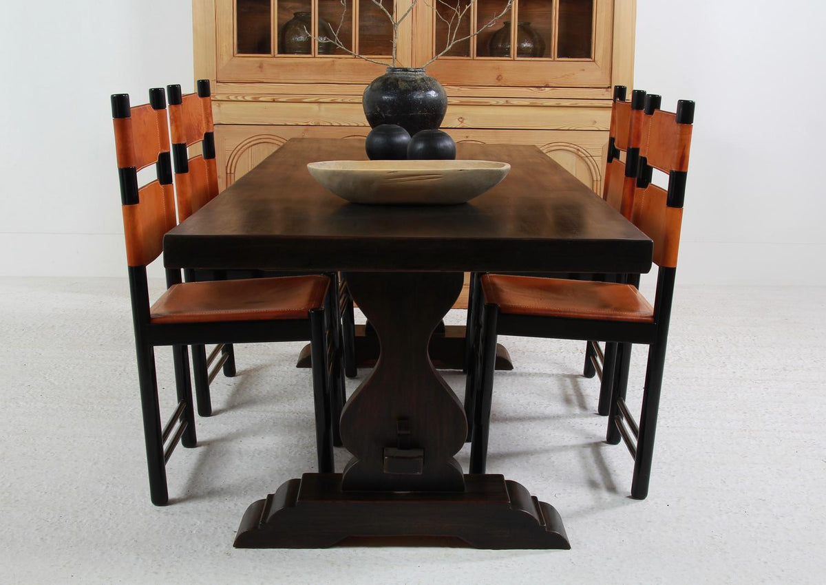 IMPRESSIVE FRENCH EARLY 20THC WALNUT DINING TABLE IN STRIKING BLACK PATINA
