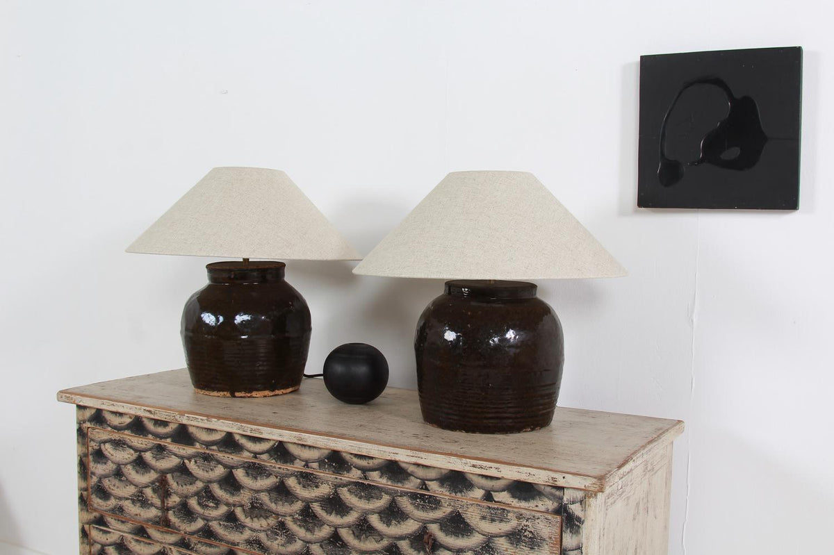 COLLECTION OF TWO ANTIQUE WATER/OIL POT LAMPS WITH NATURAL BELGIUM LINEN SHADES