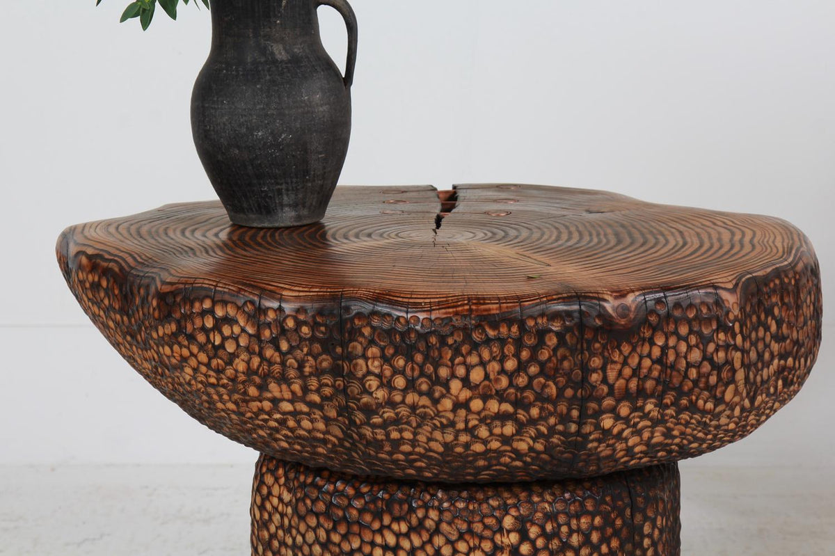 DRAMATIC HEAVILY DECORATED ARTISAN FREESTANDING CENTRE TABLE IN MATURE CEDAR. PLEASE ENQUIRE