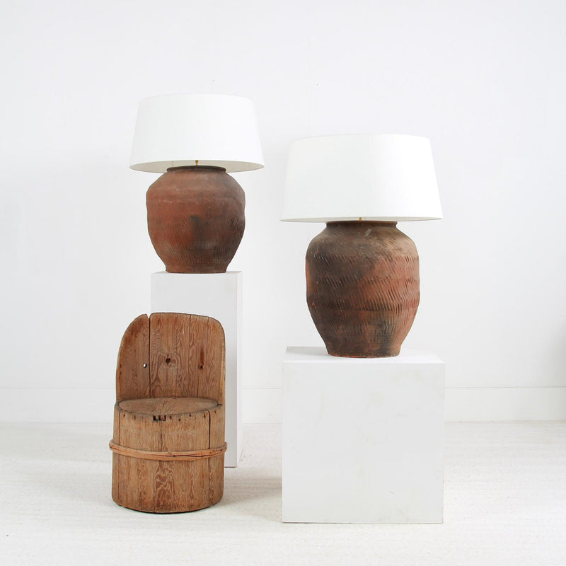 GRAND SCALE CHINESE TEXTURED ANTIQUE TABLE LAMPS WITH OFF WHITE LINEN DRUM SHADES