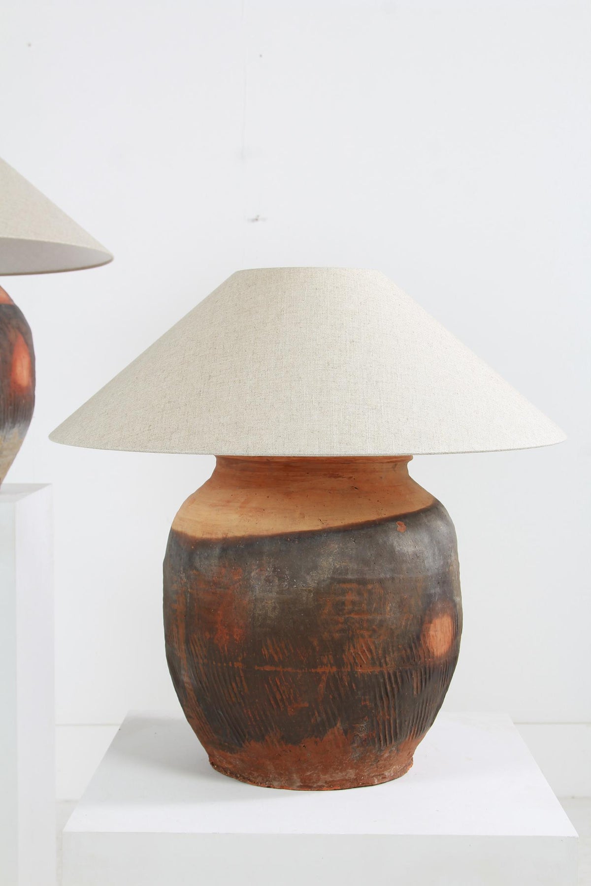 EXCEPTIONAL XXL ANTIQUE UNGLAZED POTTERY LAMPS WITH EMPIRE LINEN SHADES