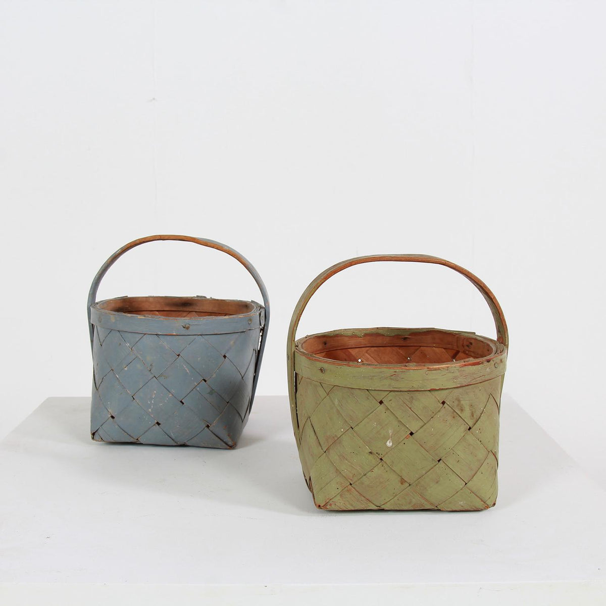 TWO SUPERBLY CRAFTED PAINTED SWEDISH SPLINT WOVEN BERRY BASKETS