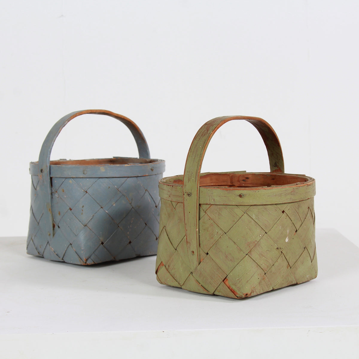 TWO SUPERBLY CRAFTED PAINTED SWEDISH SPLINT WOVEN BERRY BASKETS