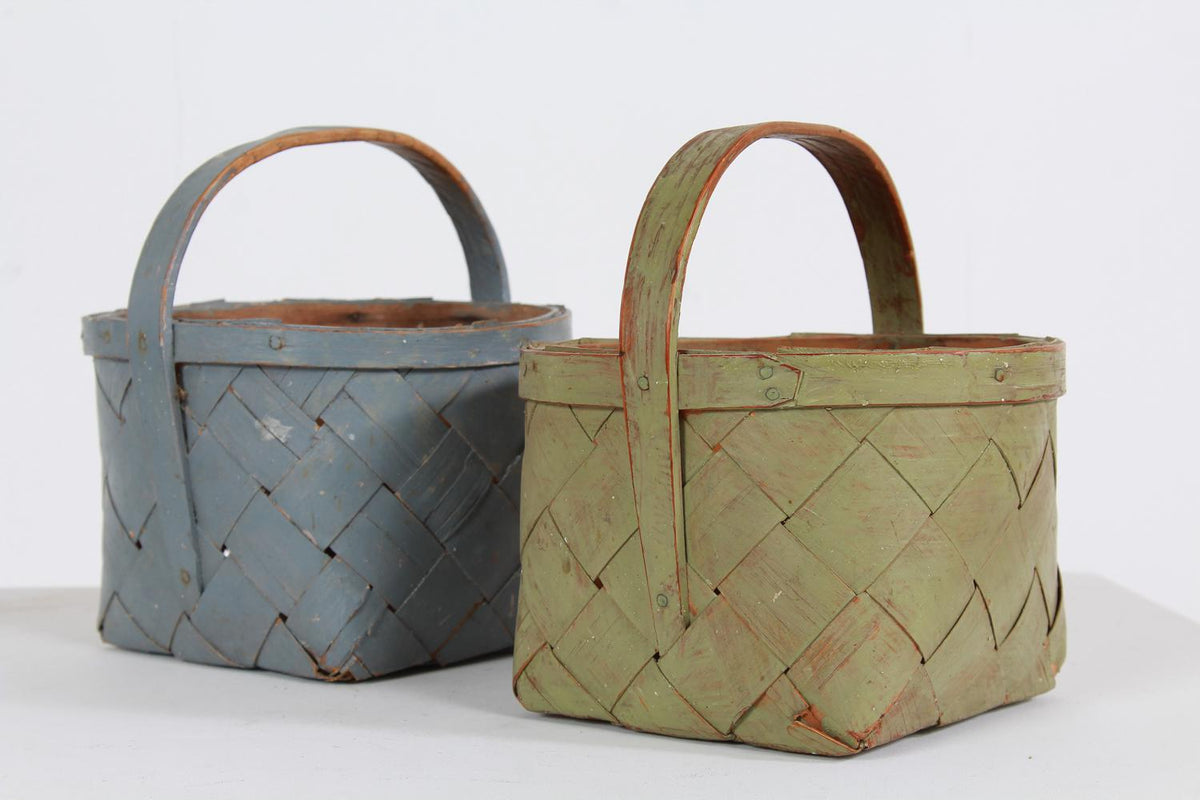 TWO SUPERBLY CRAFTED PAINTED SWEDISH SPLINT WOVEN BERRY BASKETS