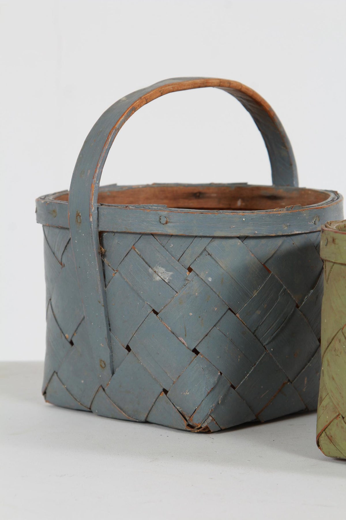 TWO SUPERBLY CRAFTED PAINTED SWEDISH SPLINT WOVEN BERRY BASKETS