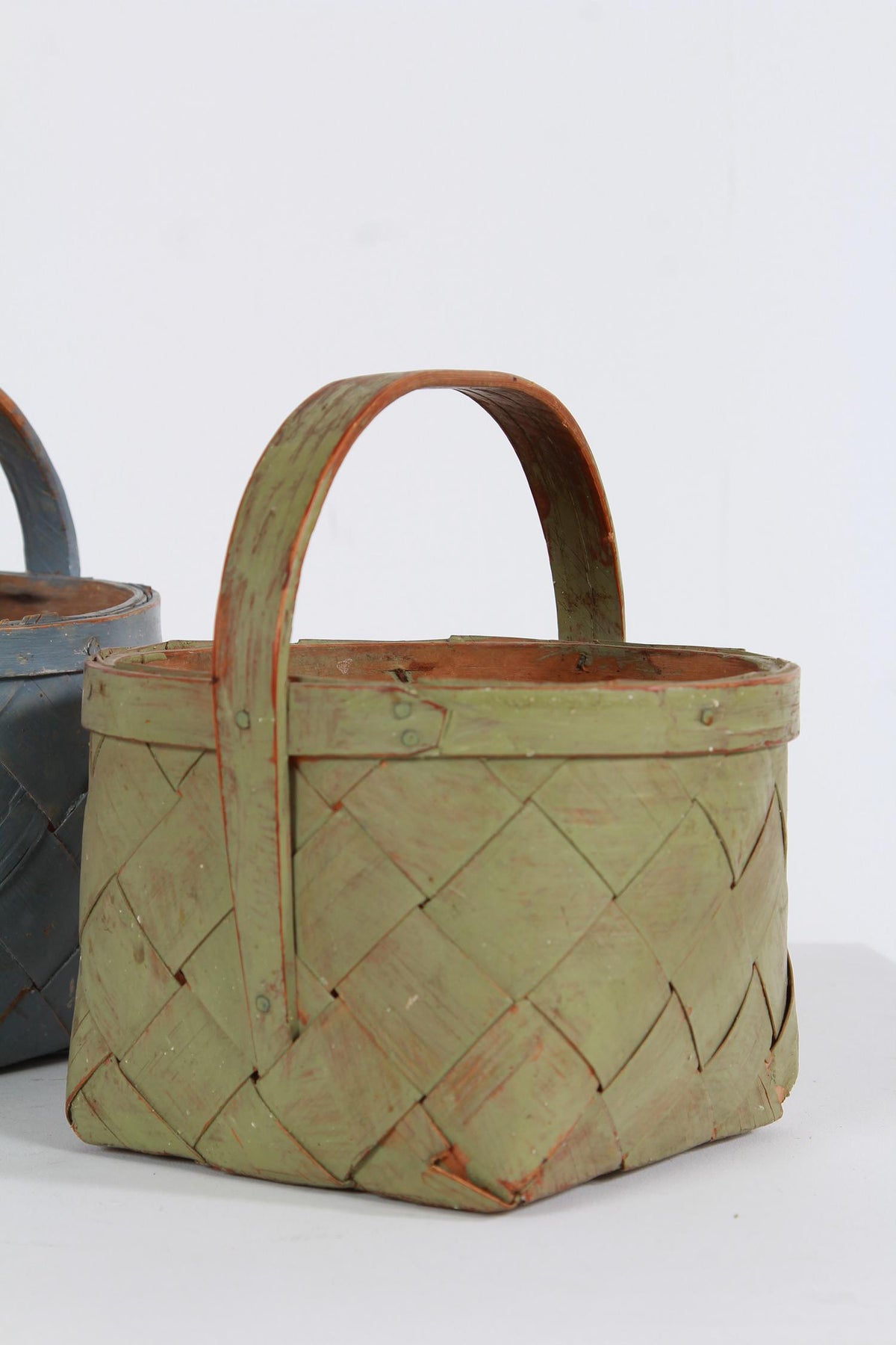 TWO SUPERBLY CRAFTED PAINTED SWEDISH SPLINT WOVEN BERRY BASKETS