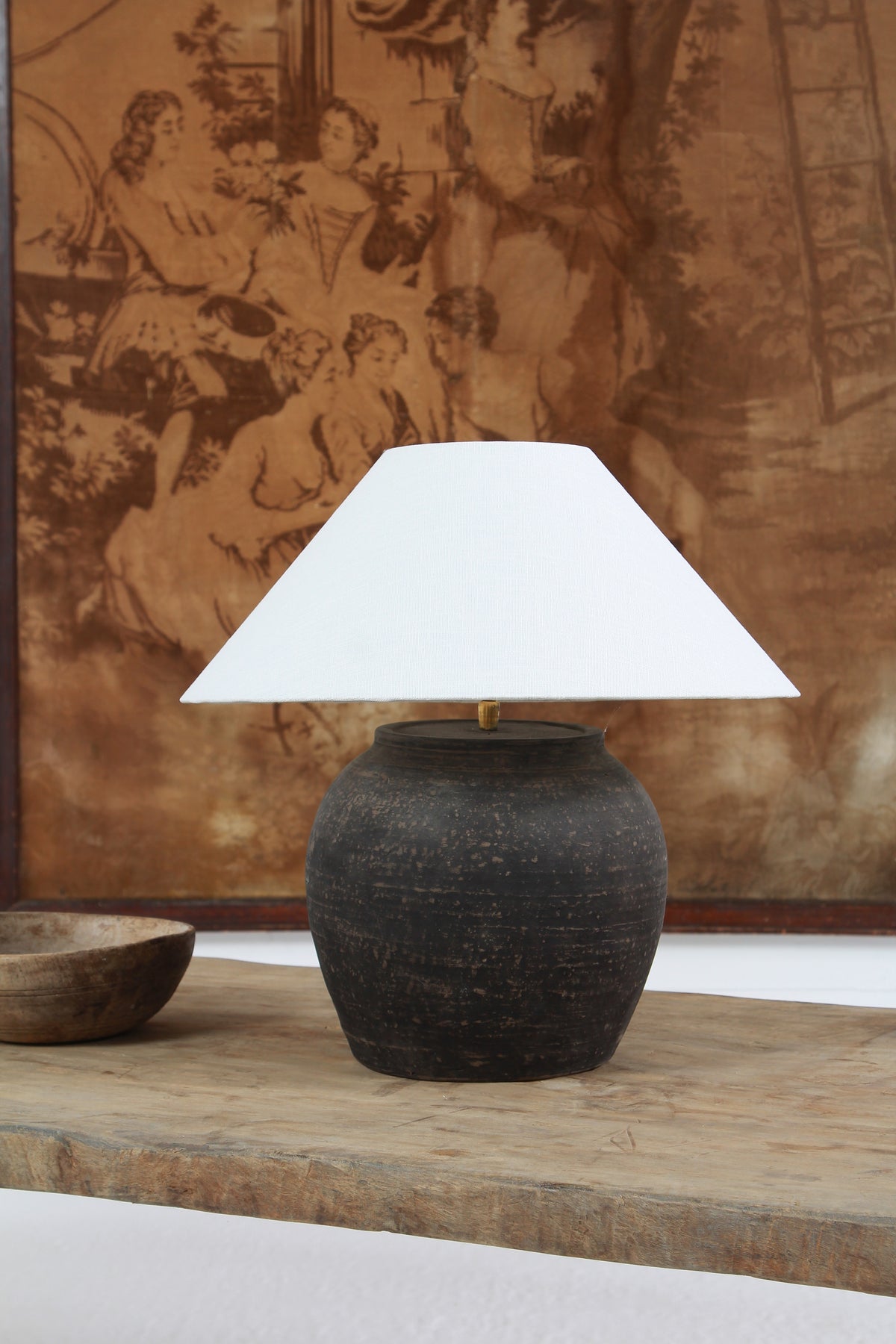 BLACK UNGLAZED POTTERY TABLE LAMP WITH WHITE EMPIRE LINEN SHADE
