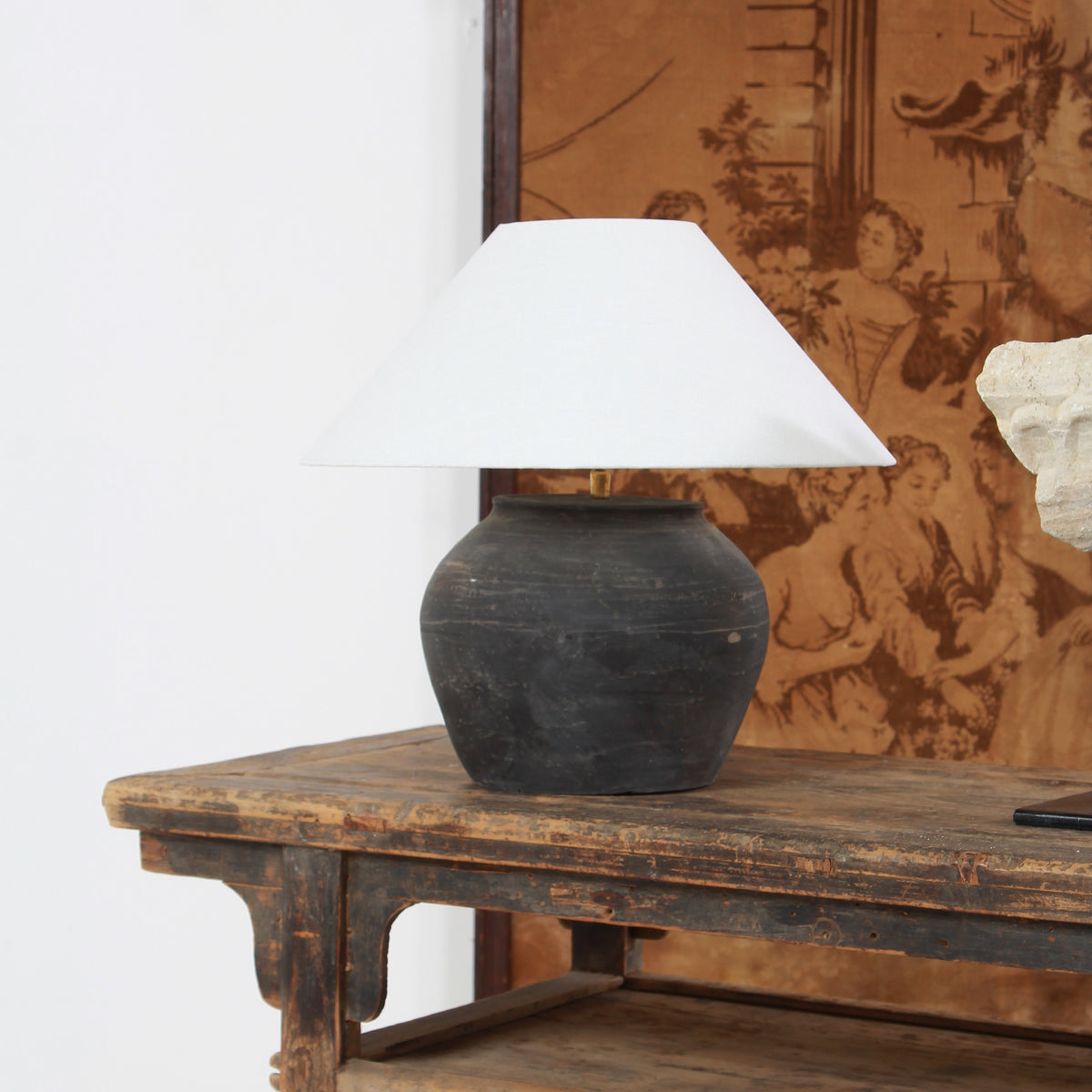 BLACK UNGLAZED POTTERY TABLE LAMP WITH WHITE EMPIRE LINEN SHADE