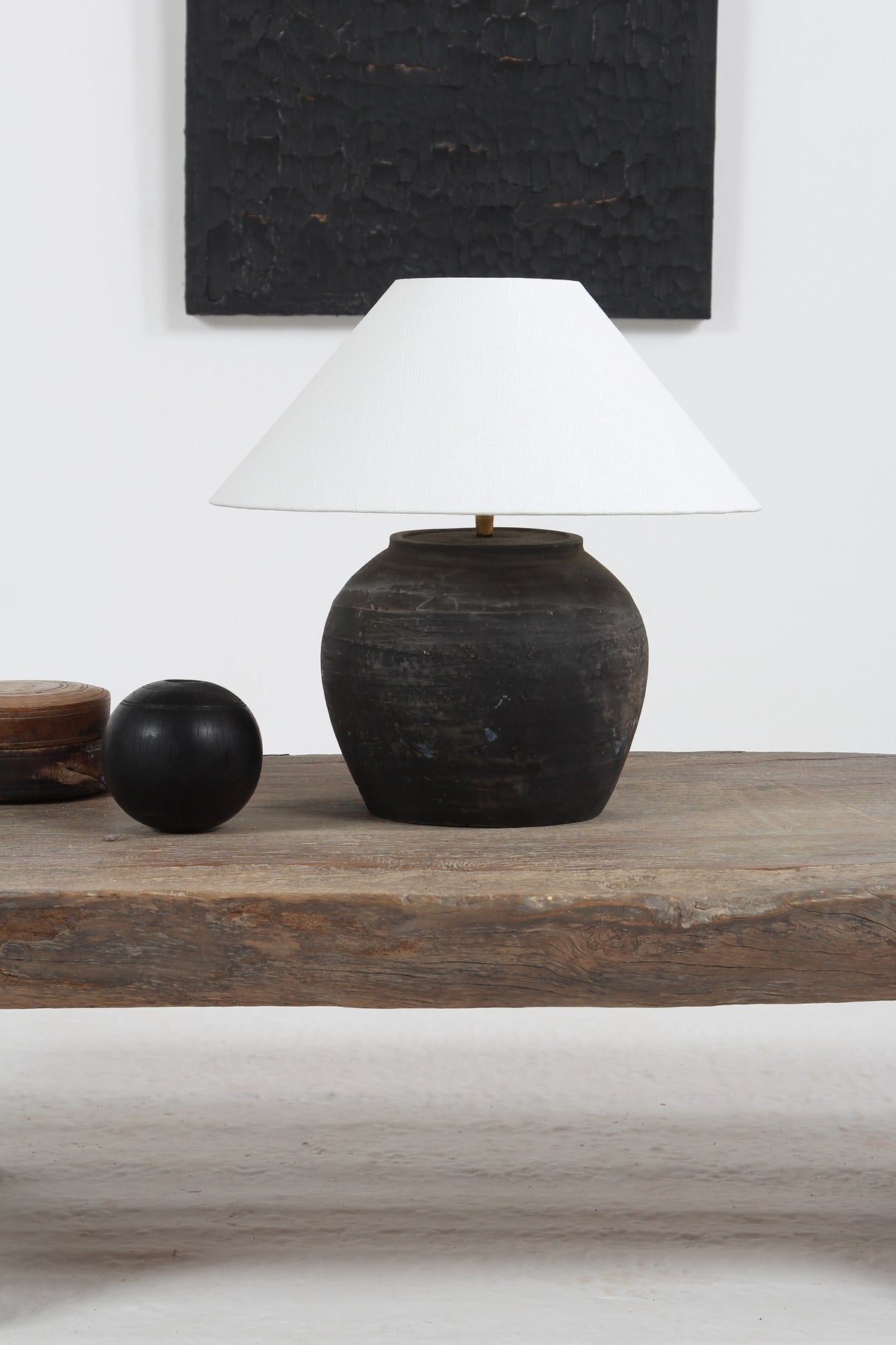 BLACK UNGLAZED POTTERY TABLE LAMP WITH WHITE EMPIRE LINEN SHADE