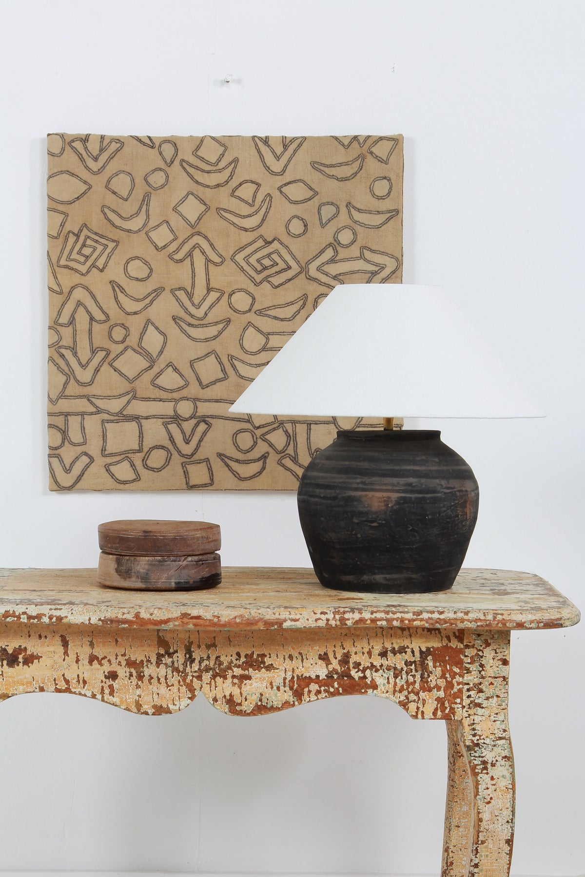 BLACK UNGLAZED POTTERY TABLE LAMP WITH WHITE EMPIRE LINEN SHADE