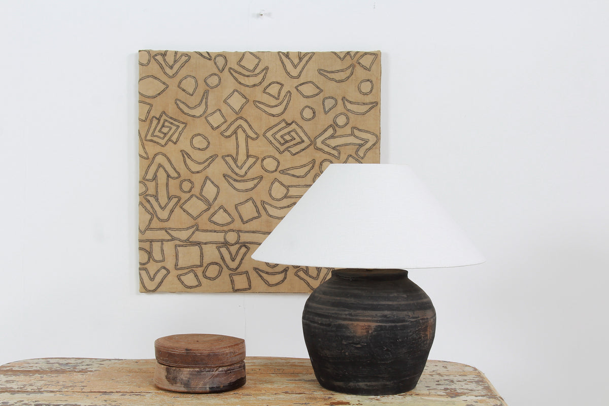 BLACK UNGLAZED POTTERY TABLE LAMP WITH WHITE EMPIRE LINEN SHADE