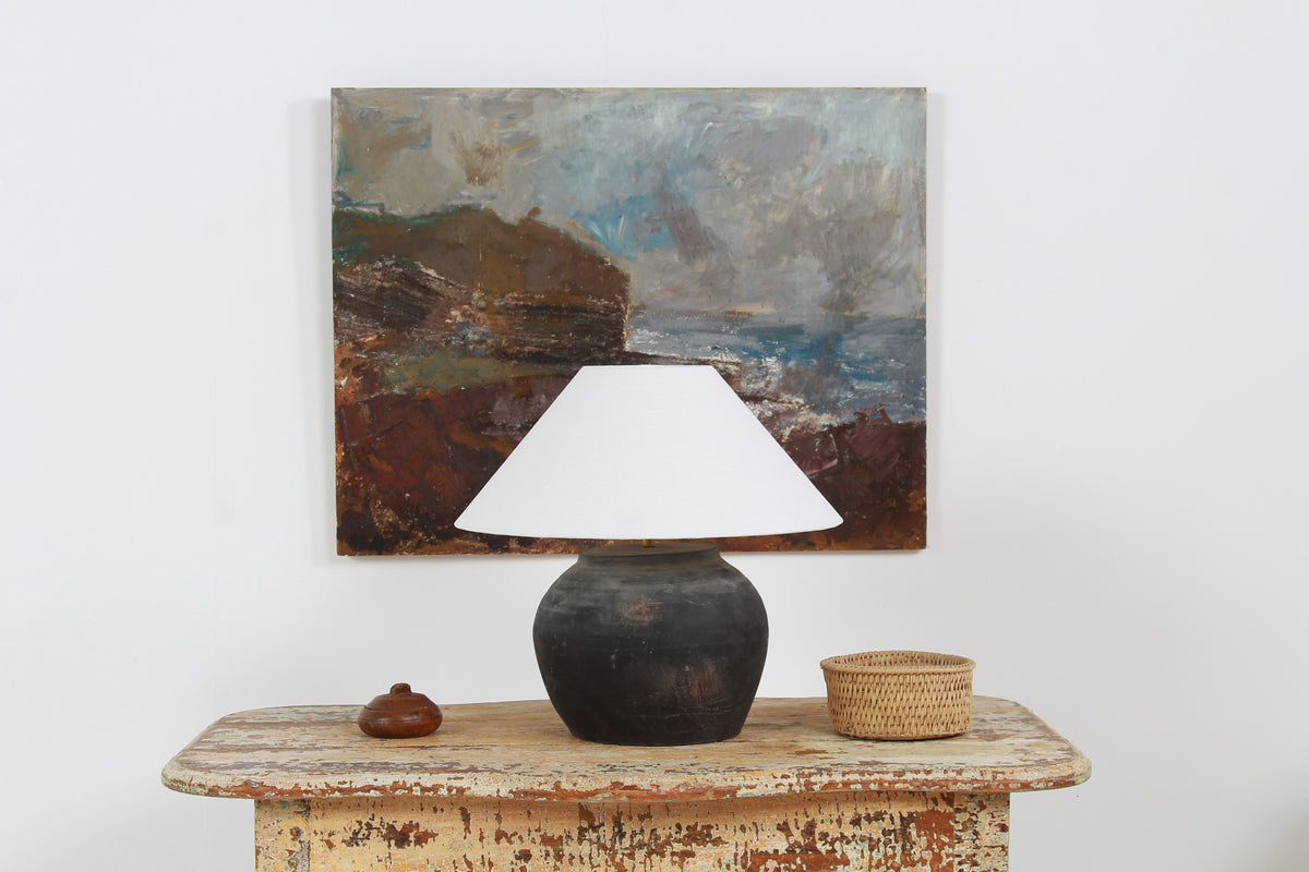CHINESE BLACK UNGLAZED POTTERY TABLE LAMP WITH WHITE EMPIRE LINEN SHADE