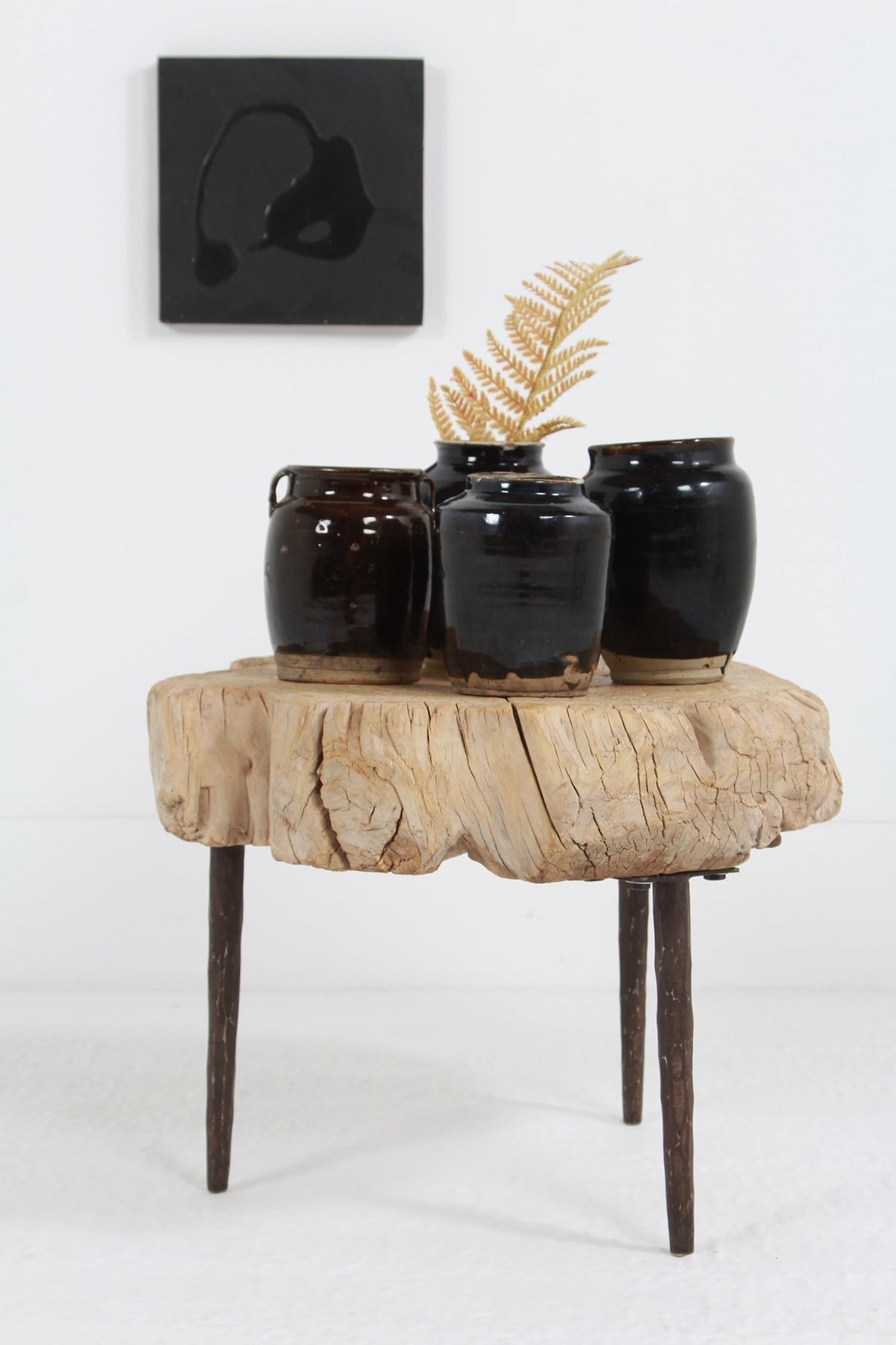 COLLECTION OF FOUR  HANDMADE CHINESE BLACK GLAZED POTTERY JARS