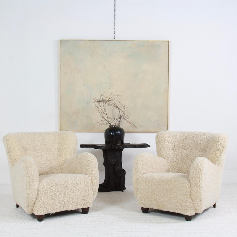 Sumptuous  Duo of Danish Cabinet Maker Lounge Chairs Upholstered in Natural Sheepskin