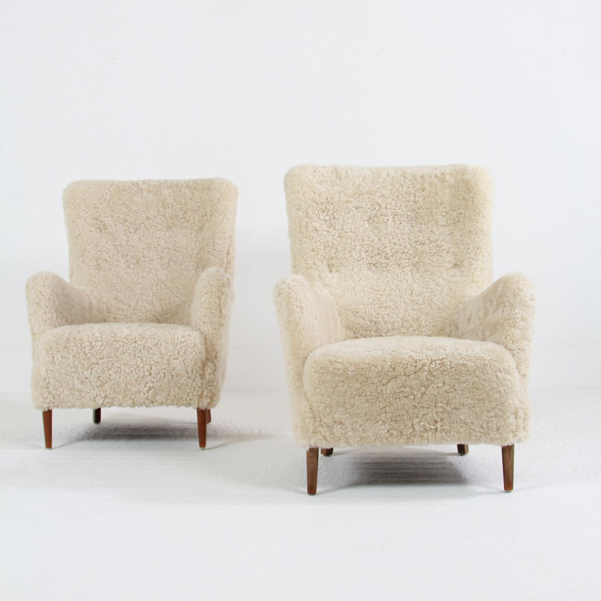 Pair of Danish Frits Henningsen High Back Lounge Chairs in Natural Sheepskin