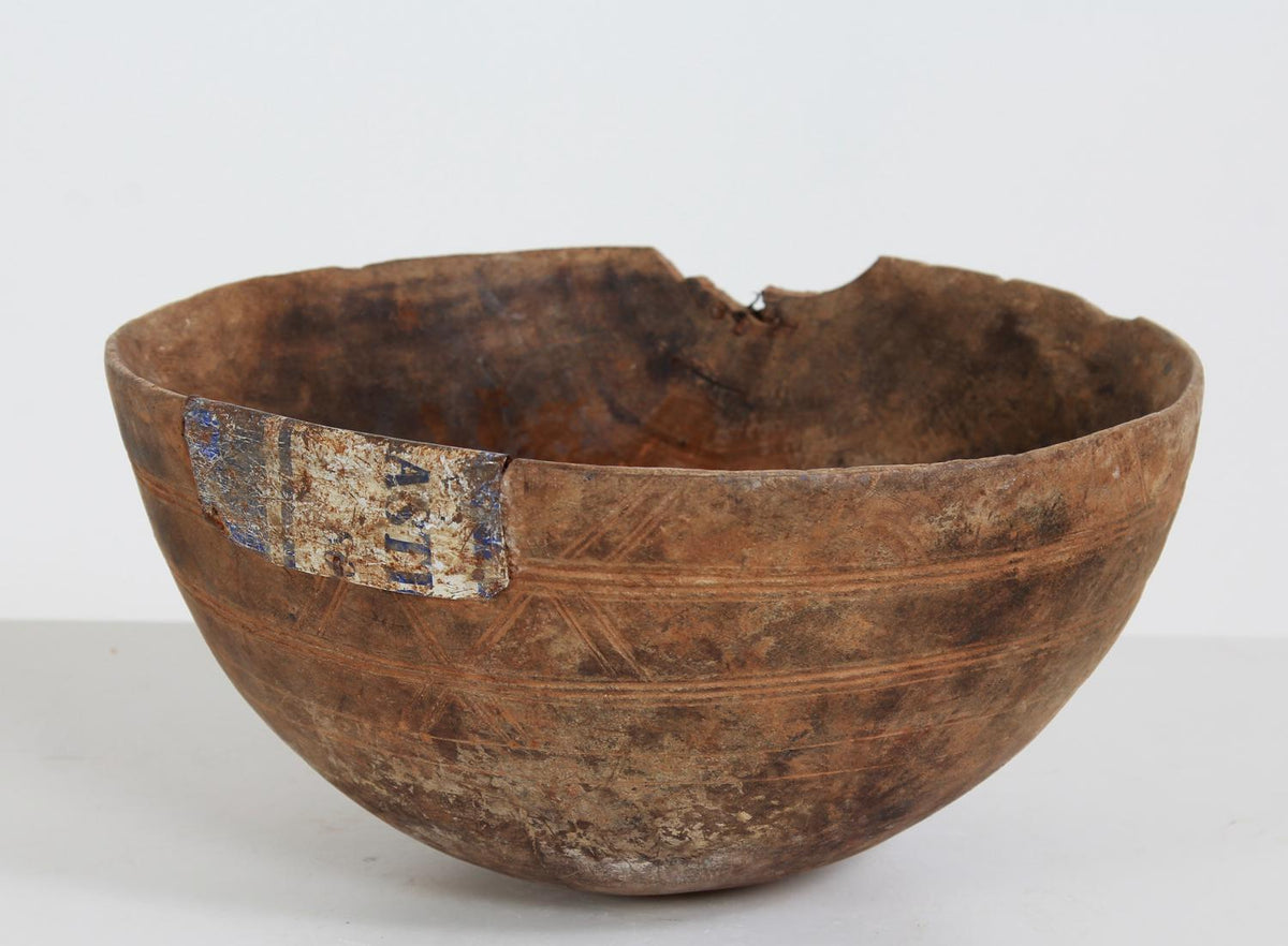 Tribal Wooden Bowl with Carved Design