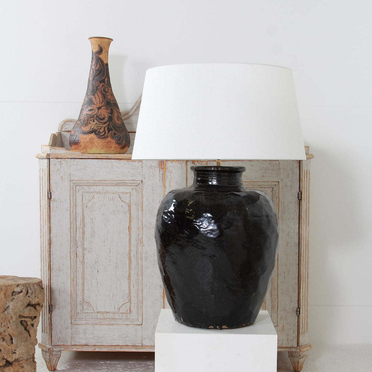 MONUMENTAL ANTIQUE BLACK GLAZED POTTERY LAMP WITH WHITE DRUM LINEN SHADE