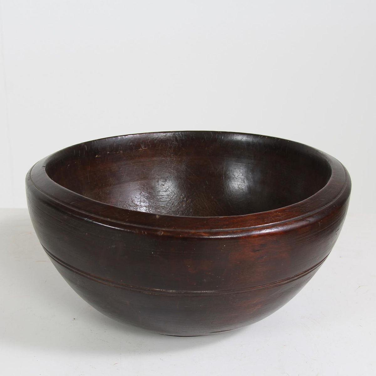 A Deeply Turned English 19thC Dark Elm Herb Chopping Bowl