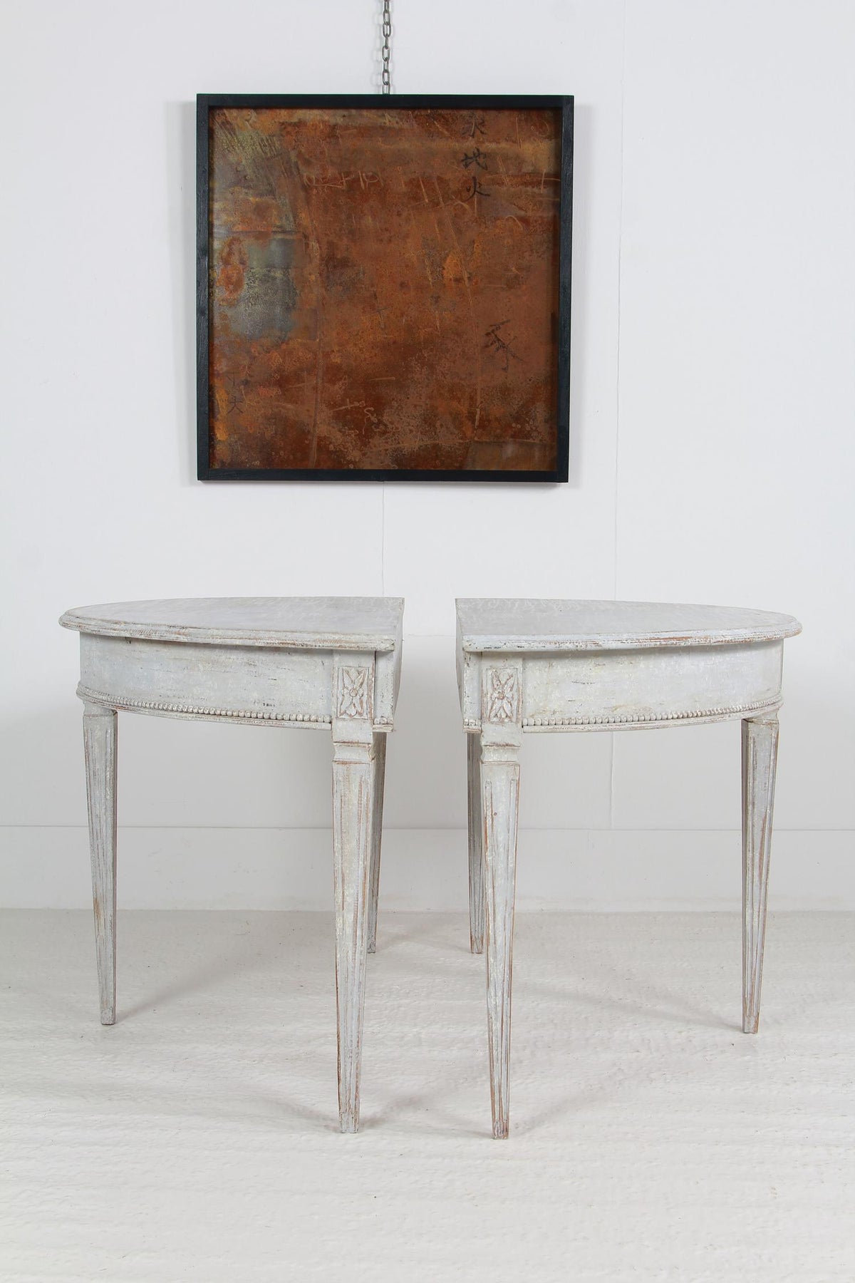 A Elegant PAIR OF 19THC SWEDISH PAINTED DEMI-LUNES OR CONSOLE TABLES