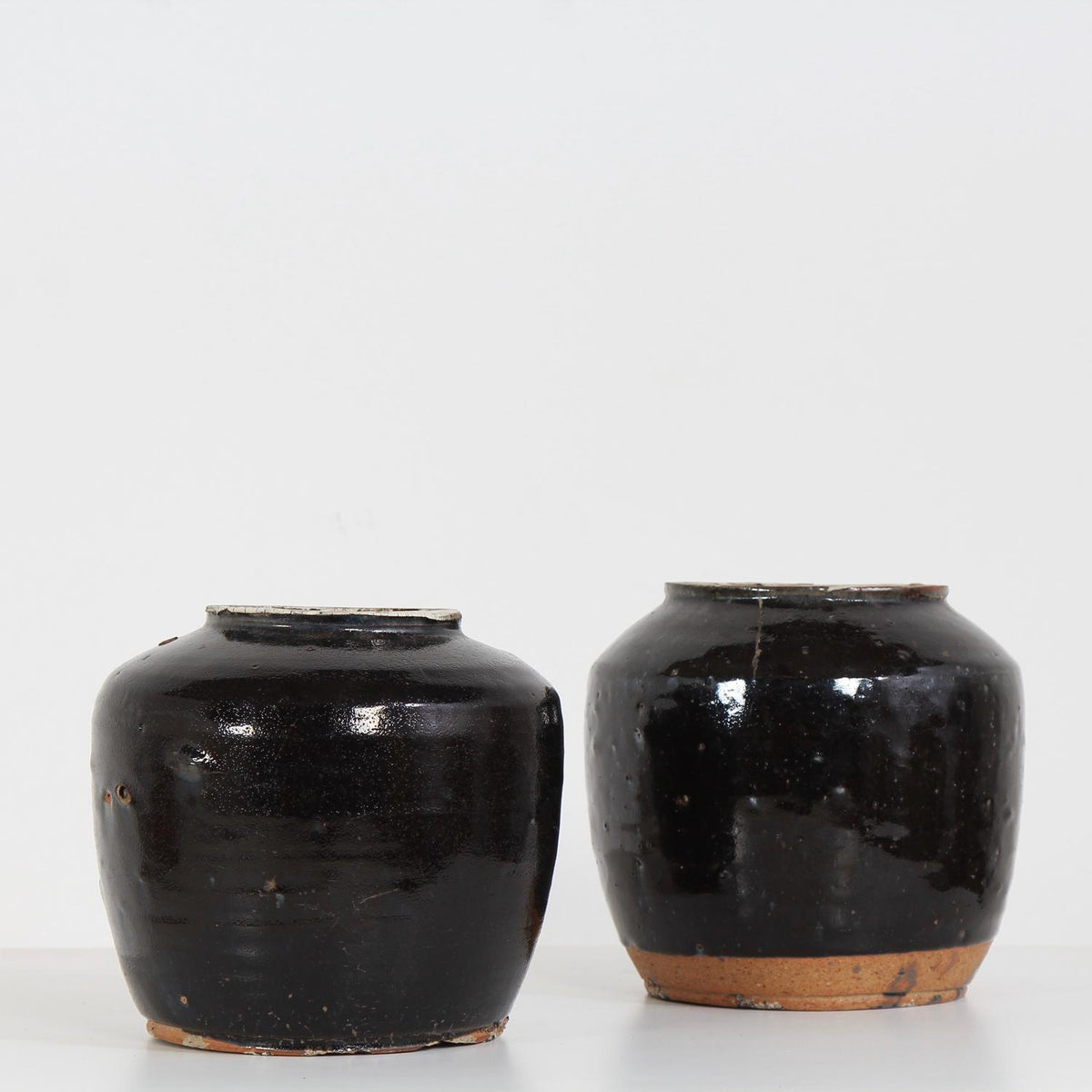 Collection of Two Handmade Chinese  Black Glazed Pottery Jars