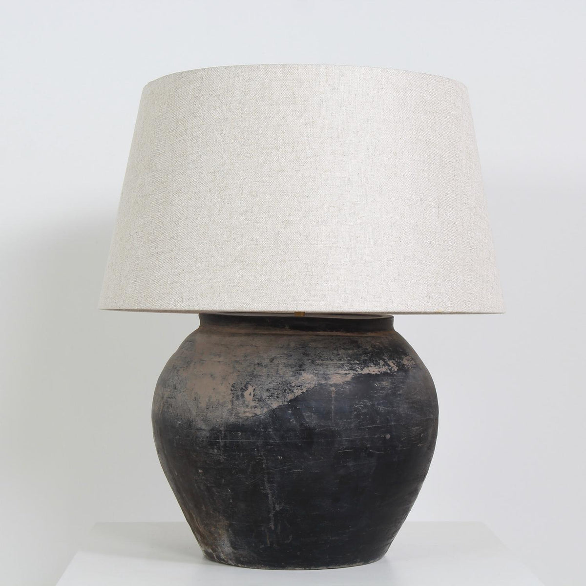 Voluptuous   CHINESE STORAGE JAR CONVERTED LAMP WITH NATURAL LINEN SHADE