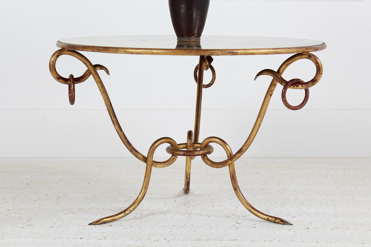 Original coffee table in gilded iron by René Drouet.