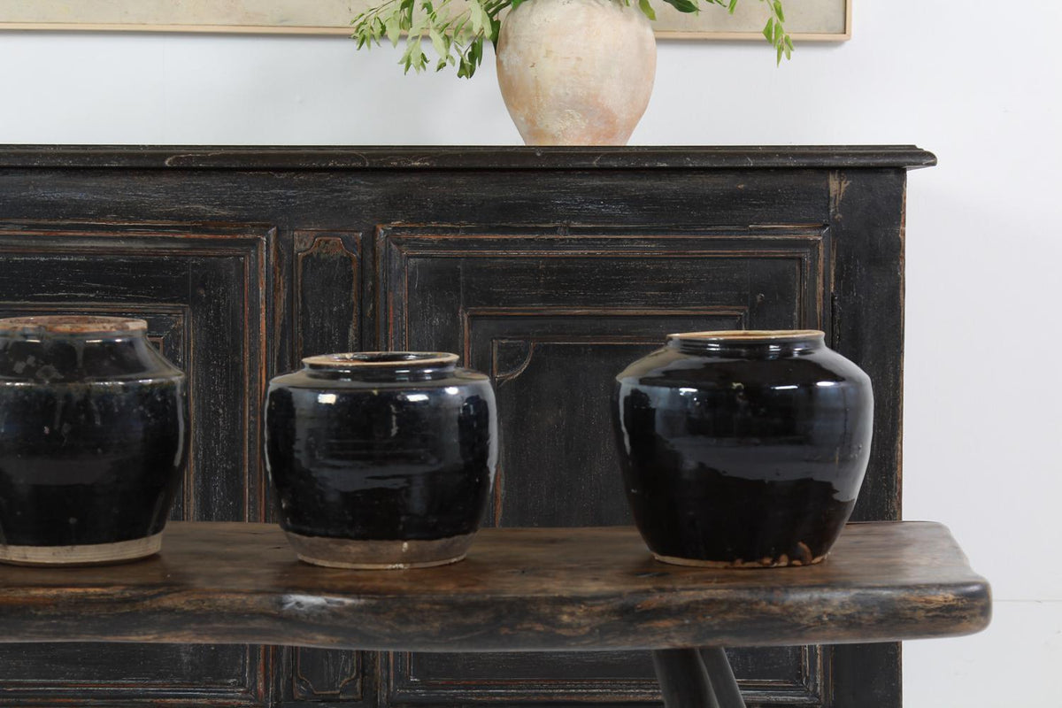 COLLECTION OF Four HANDMADE CHINESE BLACK GLAZED POTTERY JARS
