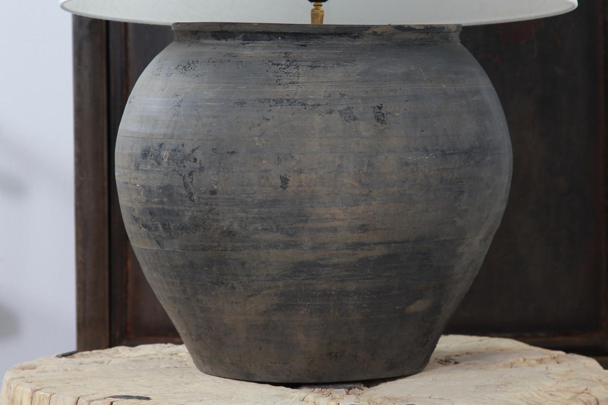 XXL ANTIQUE BLACK UNGLAZED POTTERY LAMP WITH WHITE LINEN DRUM SHADE
