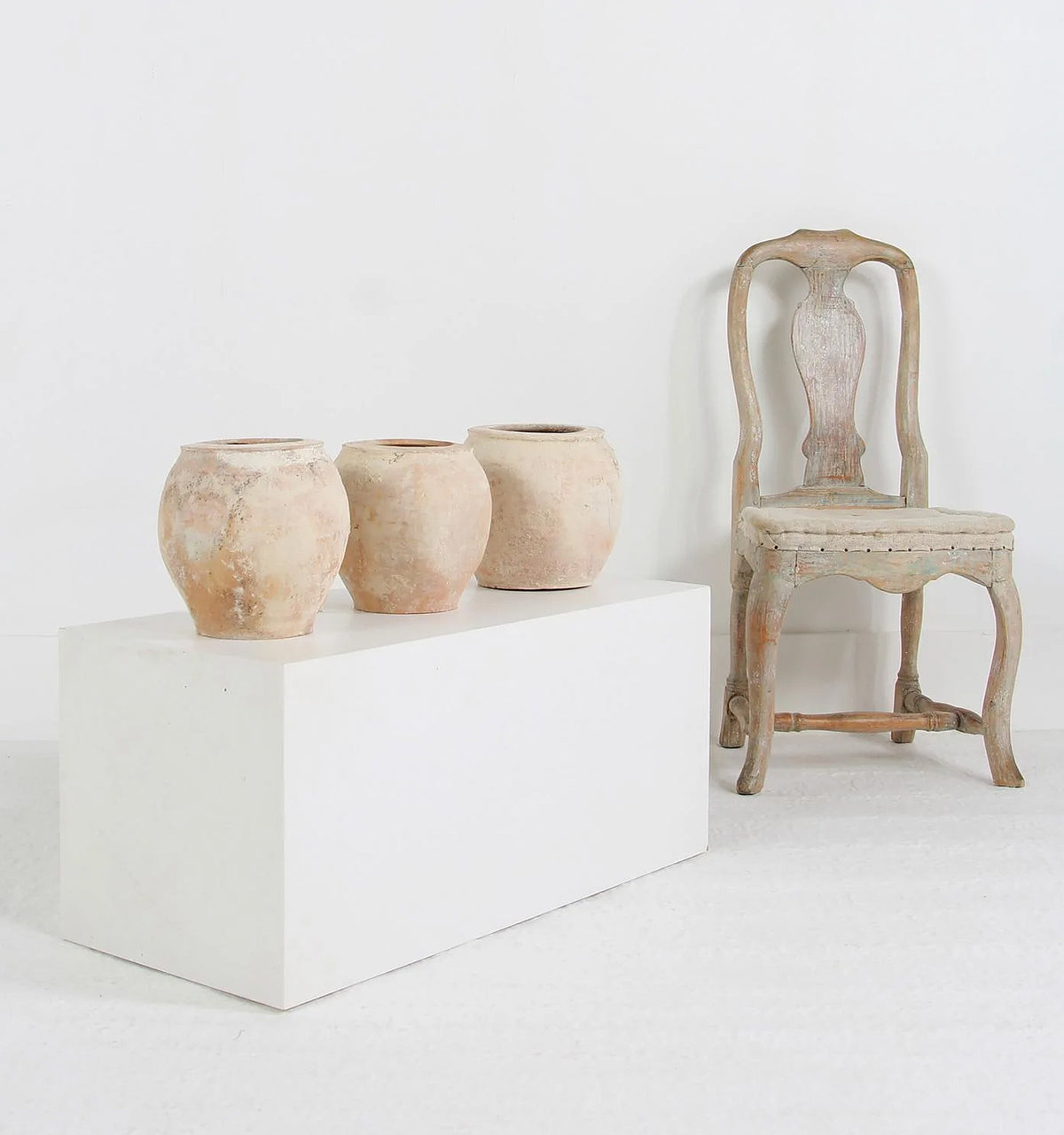 Collection of three terracotta Mediterranean storage jars
